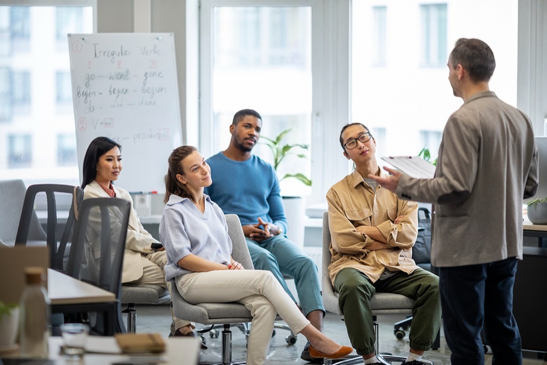 A team collaborating in a bright meeting room